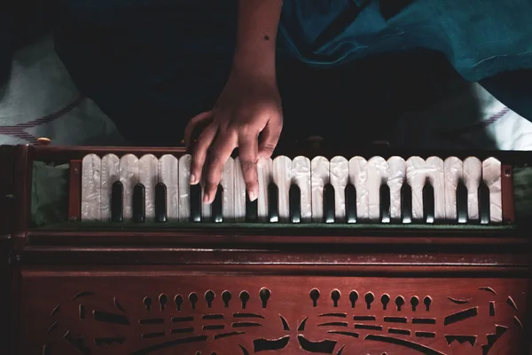 Virtual harmonium — wooden keyboard instrument close-up